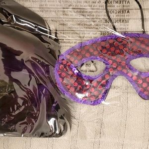 Mardi Gras mask Purple and red with black feathers